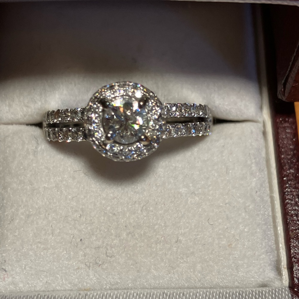 Authentic 14 Kt White Gold Diamond Halo Ring.